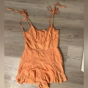 orange morning mist romper